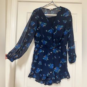Francesca’s Navy Floral Long Sleeve Romper